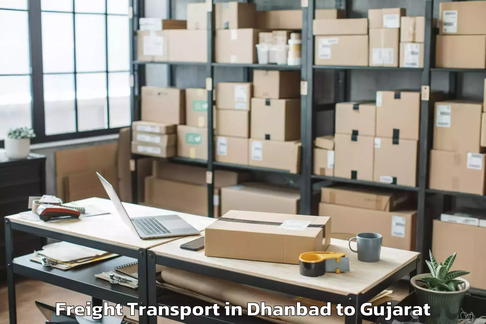 Top Dhanbad to Balasinor Freight Transport Available